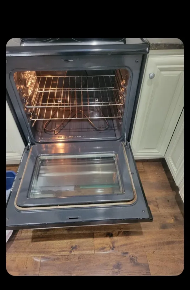 Oven door glass after a Happy Maids move-in clean
