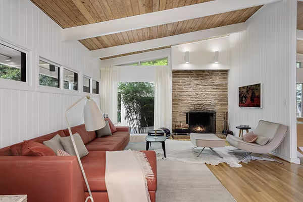 A bright living room cleaned to the homeowner’s chosen plan